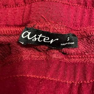 Size small red shorts from Aster.